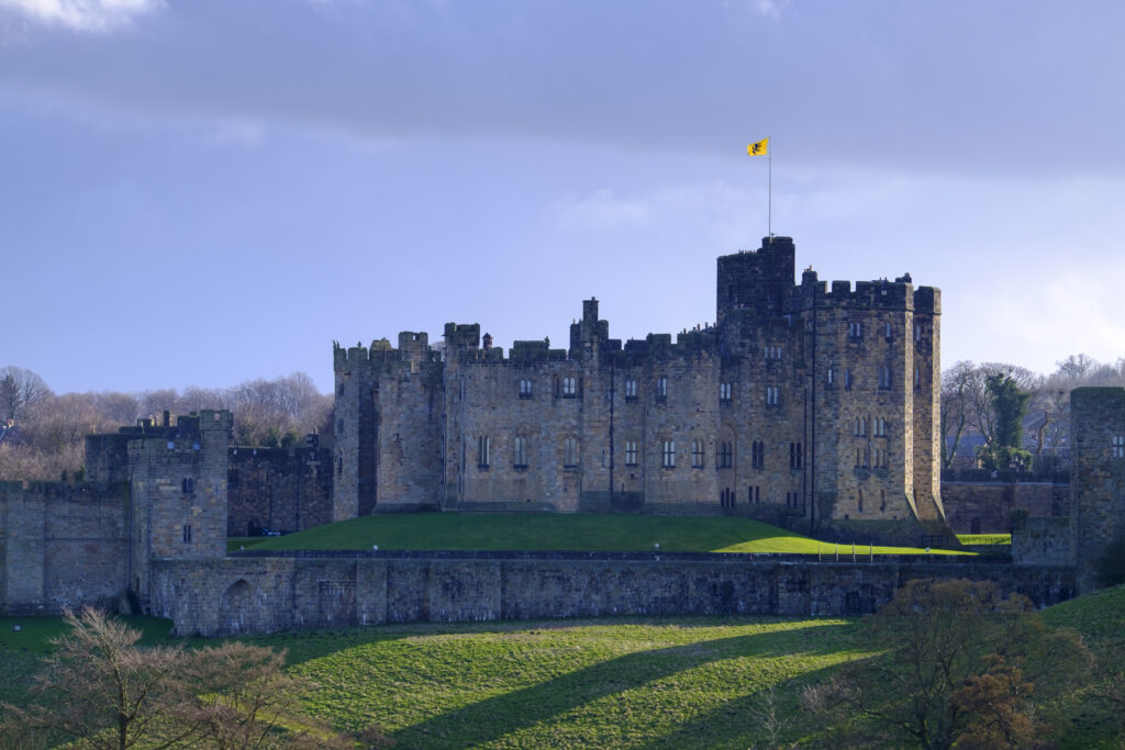 England, Northumberland, Alnwick. Alnwick castle is one of the finest medieval castles to be found in England. Often referred as 'The Windsor of the North', it was also a Harry Potter Movie set.