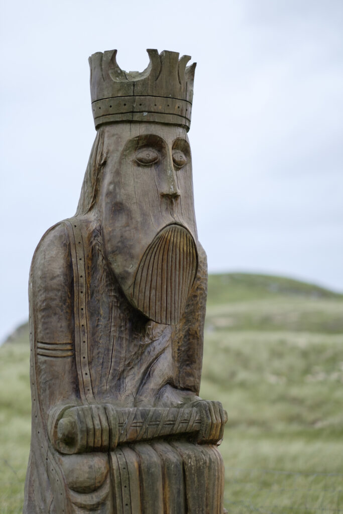 Scotland, The Isle of Lewis, Uig Sands. Wooden sculpture of the Lewis chessman found near Uig Sands in the area of Uig.
