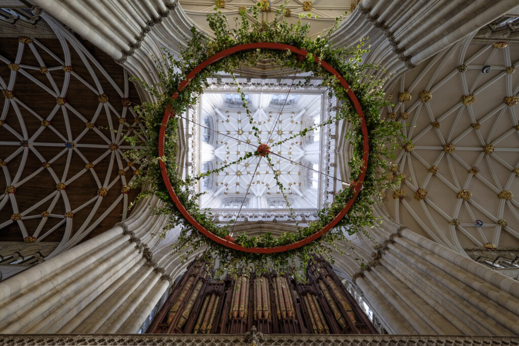 England, North Yorkshire, York Minster Cathedral. Christmas wreath and ceiling details of The Nave at York Minster.