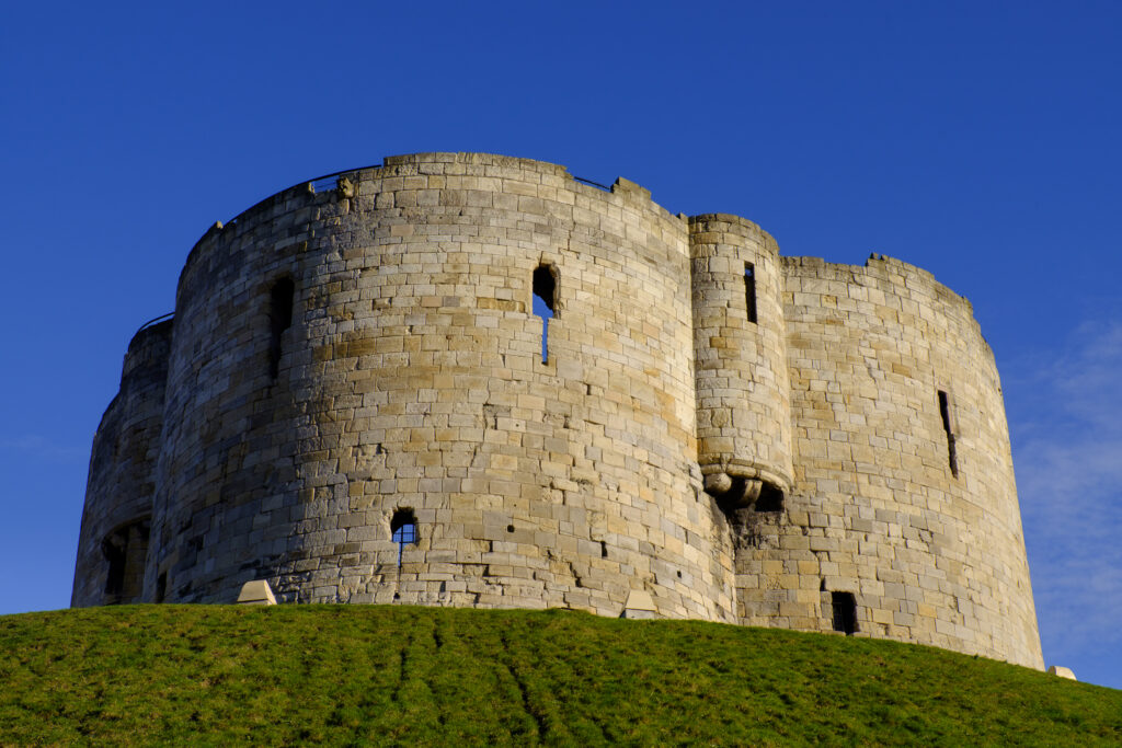 England, North Yorkshire, York City. Cliffords Tower / York Castle in the city of York.