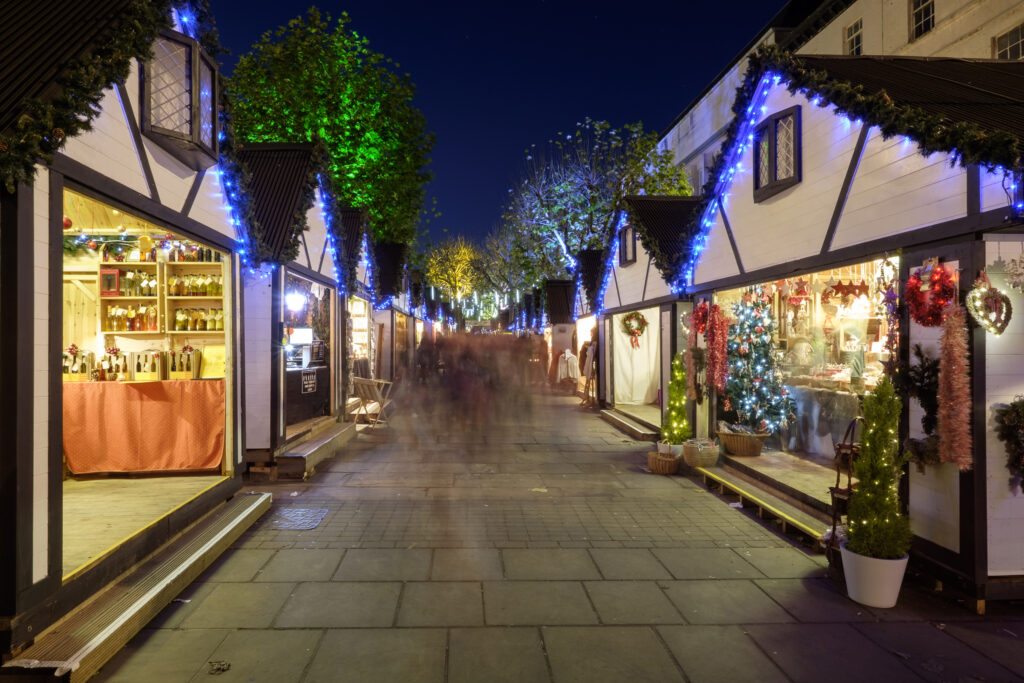 England, North Yorkshire, York City. Christmas Market on Parliament Street.