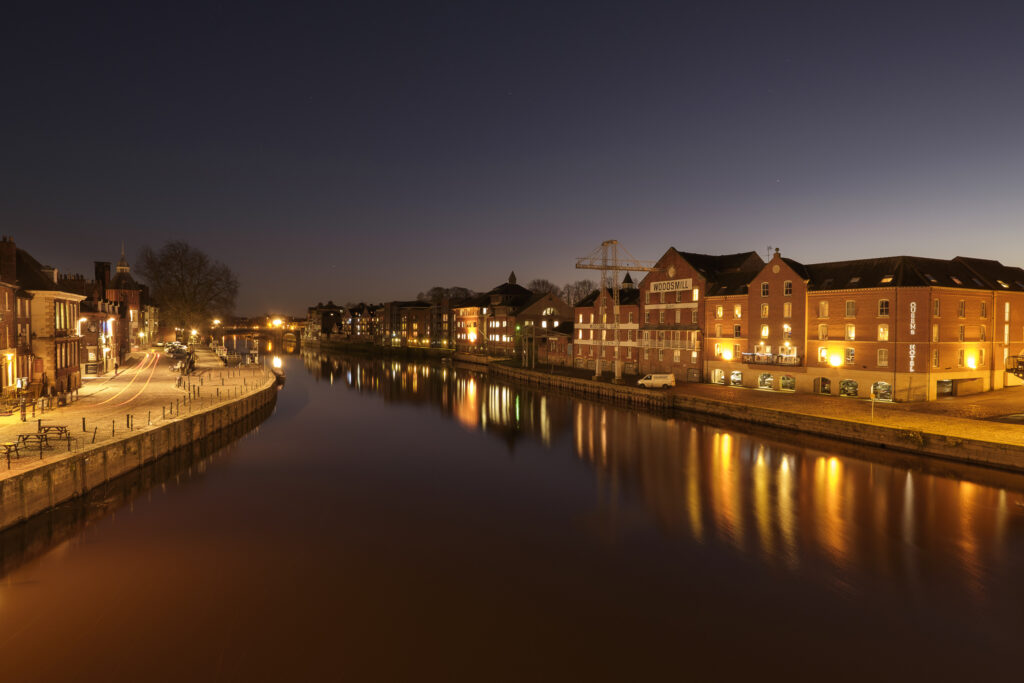 England, North Yorkshire, York City. Woodsmill Quay, Queens Staith and the River Ouse at night.