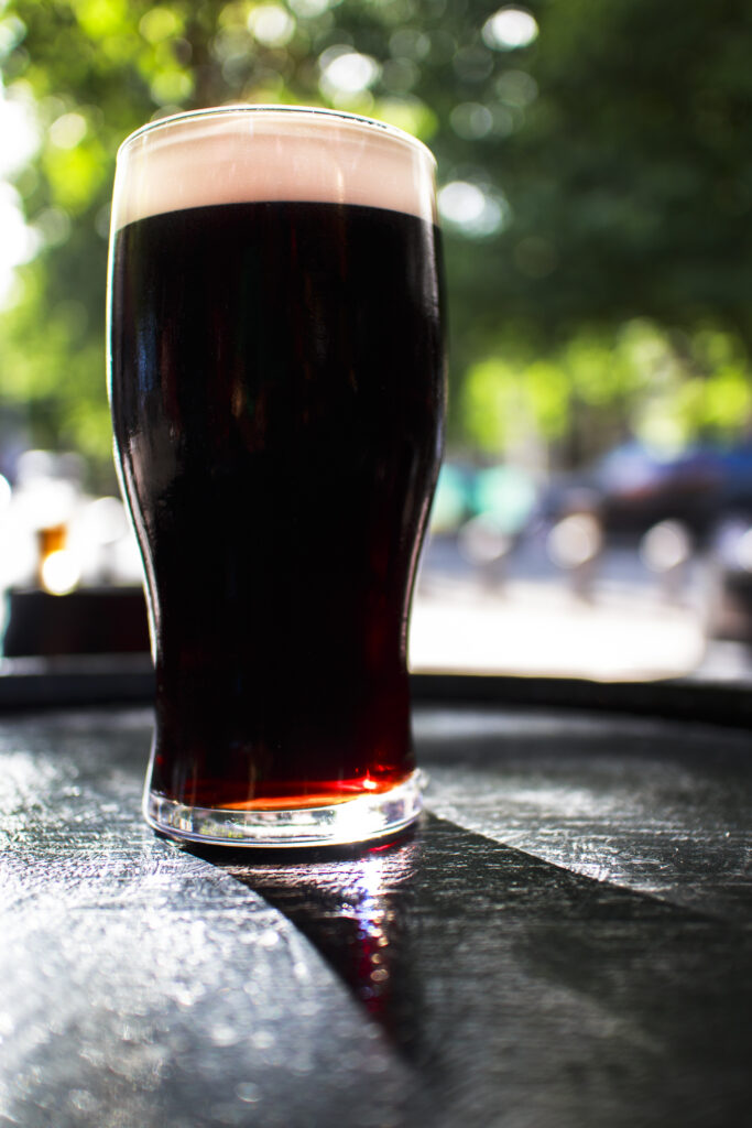 Republic of Ireland, County Dublin, Dublin City. A pint of Irish Stout outside a public house in the city of Ireland.