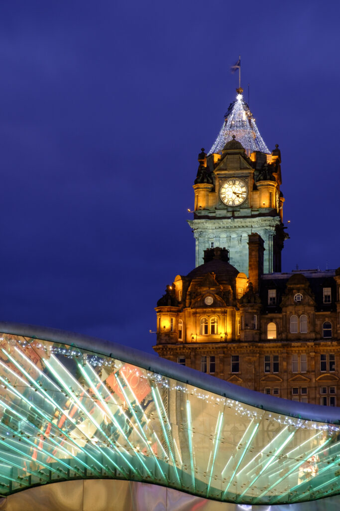 Scotland, Edinburgh, Balmoral Hotel. Balmoral Hotel clock tower (complete with Christmas decorations), often referred to as the most photographed clock tower in Scotland.
