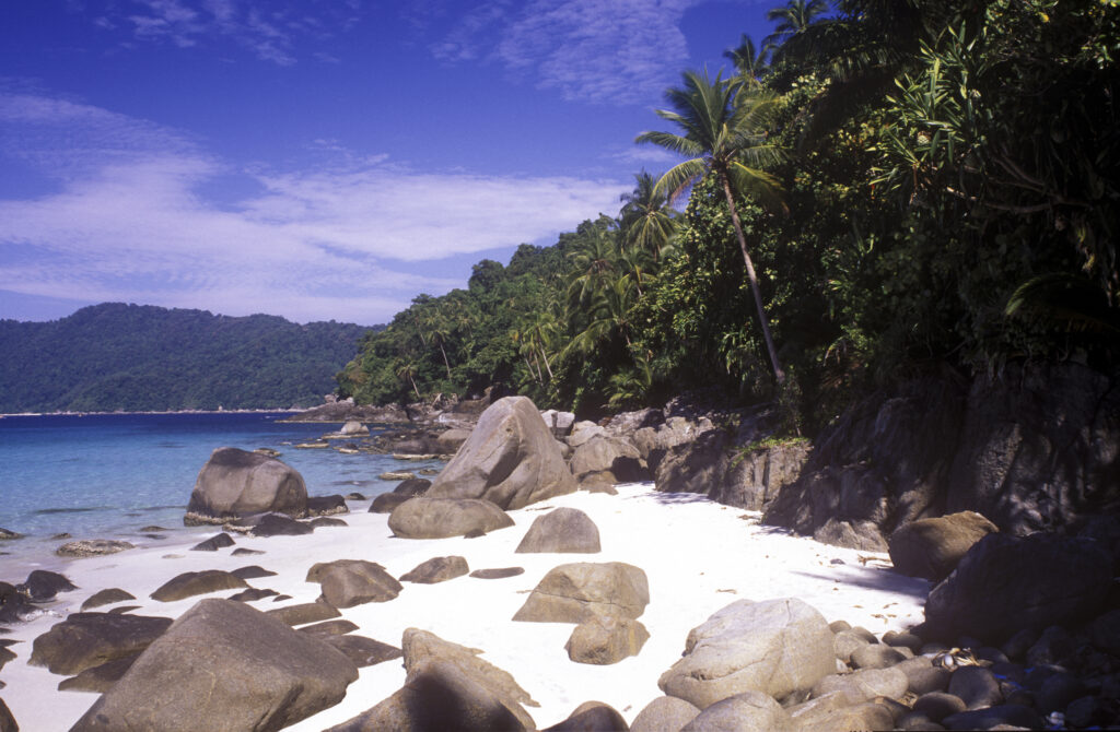 MALAYSIA, Pulau Perhentian Kecil, Long Beach. The tropical landscape and pristine white sands of this popular tourist destination.
