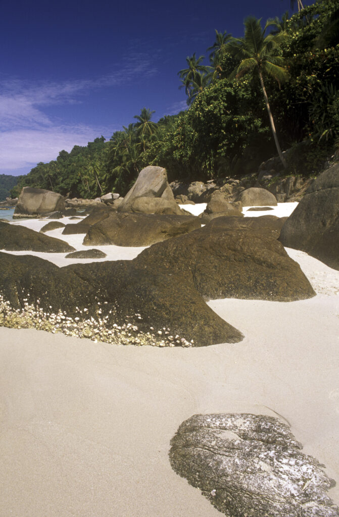 MALAYSIA, Pulau Perhentian Kecil, Long Beach. The tropical landscape and pristine white sands of this popular tourist destination.