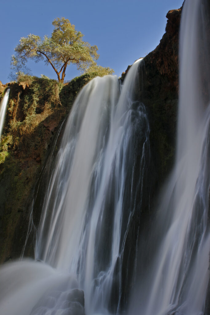 Morocco, Central Morocco, Cascades d'Ouzoud. The fast flowing waters of the Ouzoud cascade, plunging into the gorge.