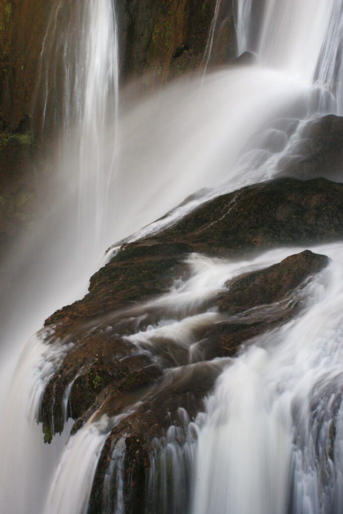 Morocco, Central Morocco, Cascades d'Ouzoud. The fast flowing waters of the Ouzoud cascade, plunging into the gorge.