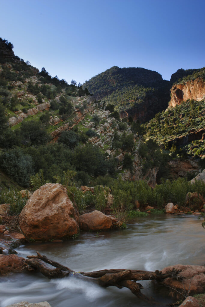 Morocco, Central Morocco, The Ouzoud Gorge. The flowing waters of the river running downstream from the cascades
