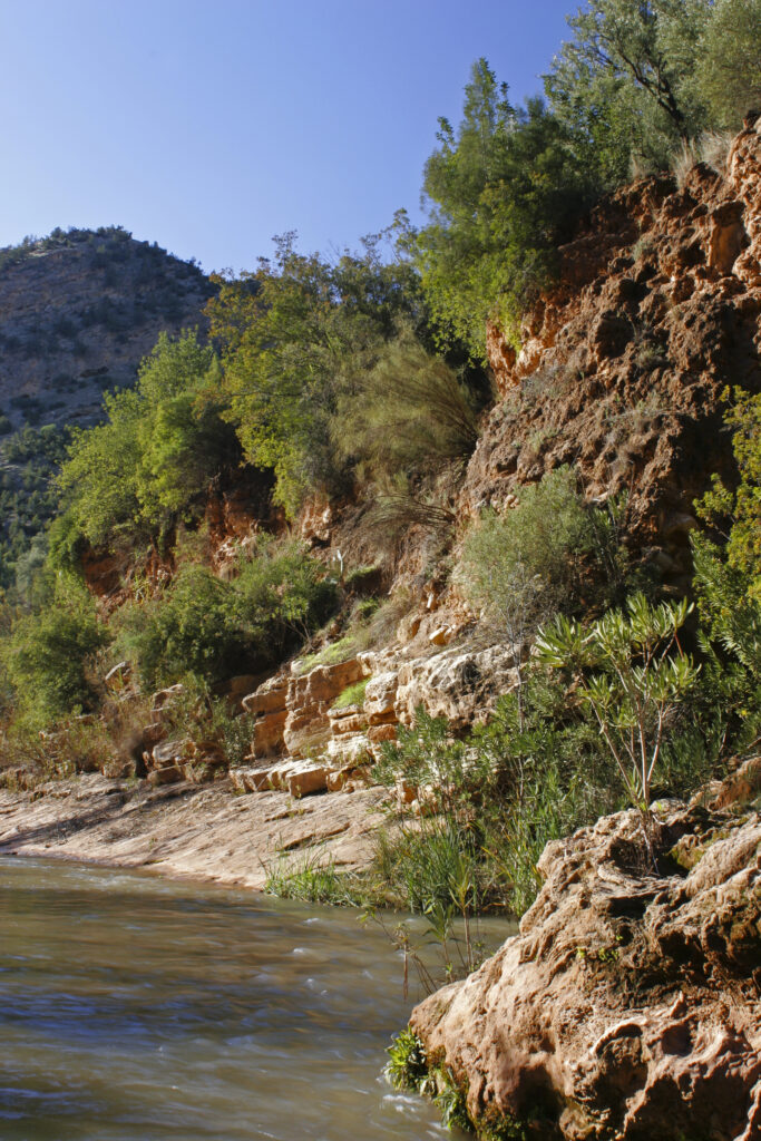 Morocco, Central Morocco, The Ouzoud Gorge. The flowing waters of the river running downstream from the cascades