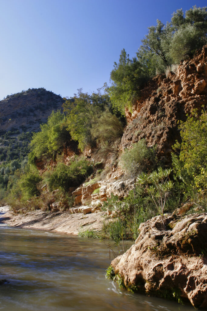 Morocco, Central Morocco, The Ouzoud Gorge. The flowing waters of the river running downstream from the cascades