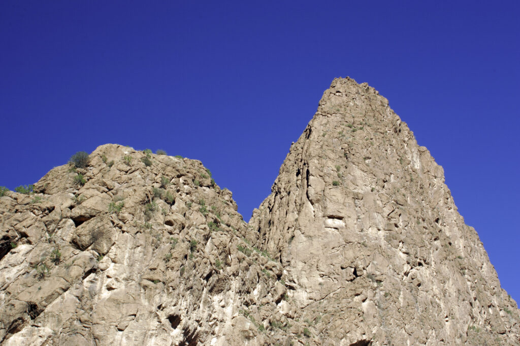 Morocco, Central Morocco, Todra Gorge. The impressive formations of the mountain peaks surrounding the Todra Gorge.
