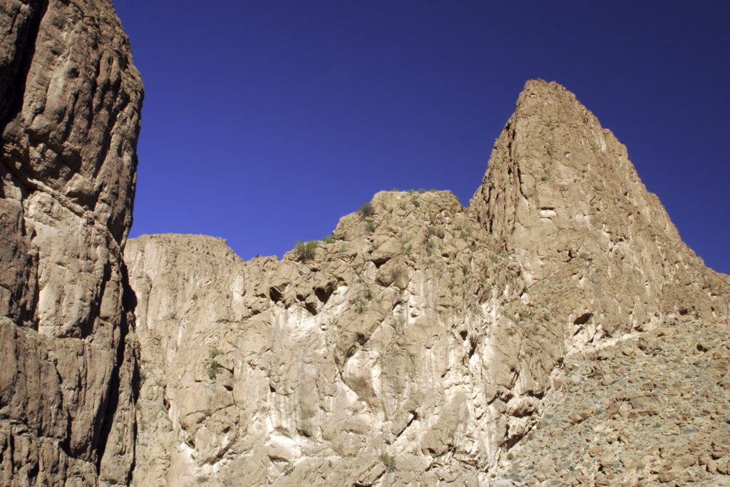 Morocco, Central Morocco, Todra Gorge. The impressive formations of the mountain peaks surrounding the Todra Gorge.