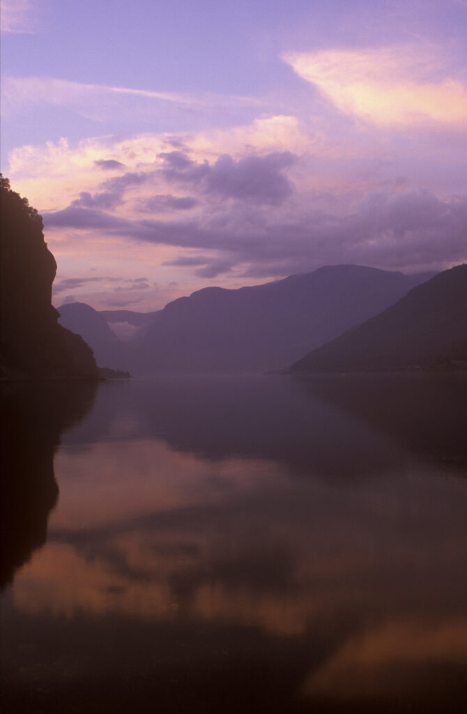 NORWAY, Sogn Og Fjordane, Aurlandsfjordan. The tranquil waters of the Aurlandsfjordan fjord a popular tourist destination