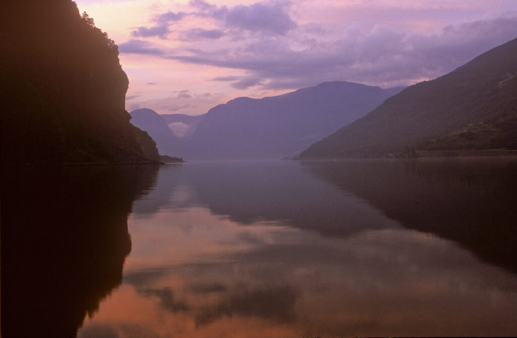 NORWAY, Sogn Og Fjordane, Aurlandsfjordan. The tranquil waters of the Aurlandsfjordan fjord a popular tourist destination