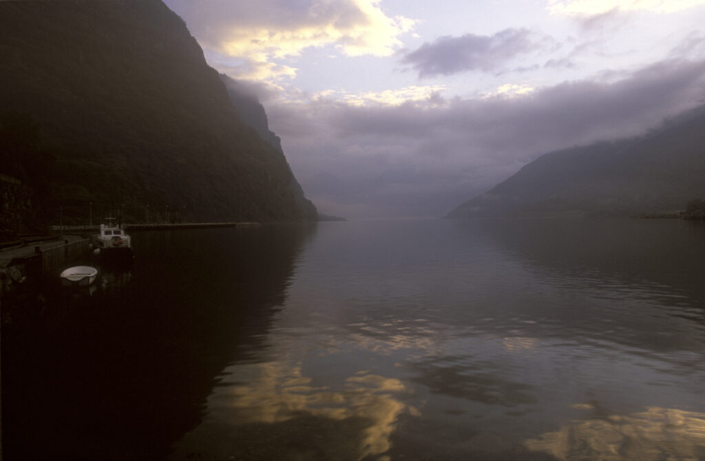 NORWAY, Sogn Og Fjordane, Aurlandsfjordan. The tranquil waters of the Aurlandsfjordan fjord a popular tourist destination