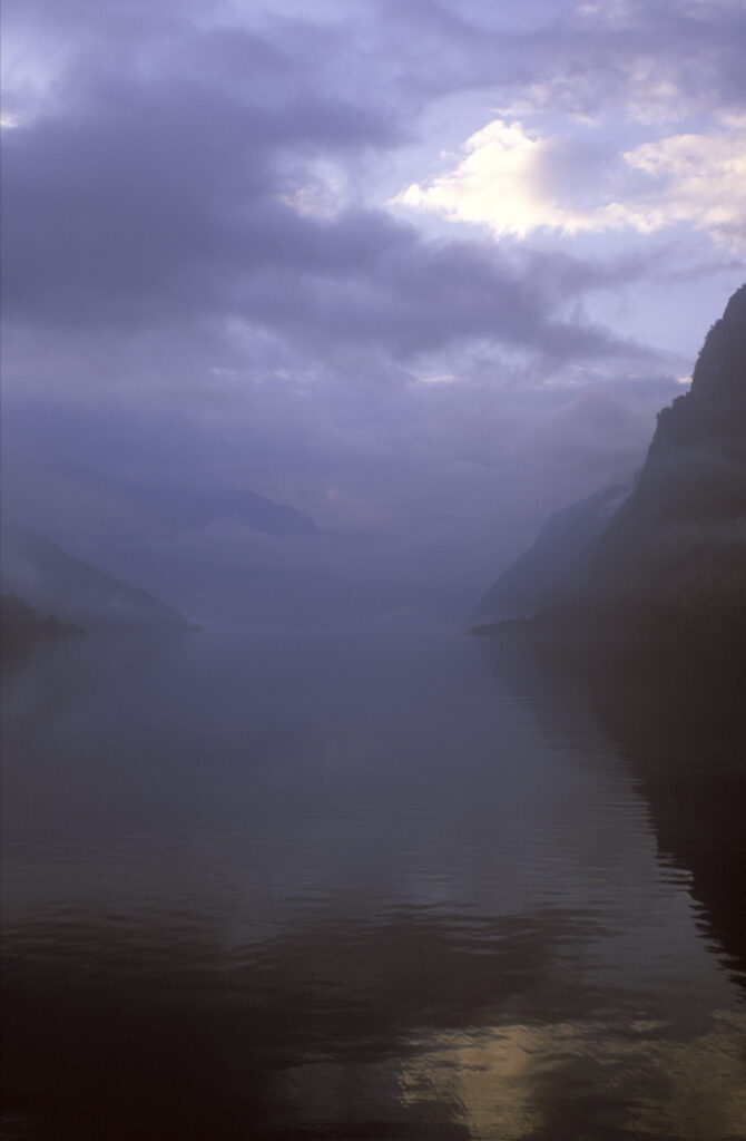NORWAY, Sogn Og Fjordane, Aurlandsfjordan. The tranquil waters of the Aurlandsfjordan fjord a popular tourist destination
