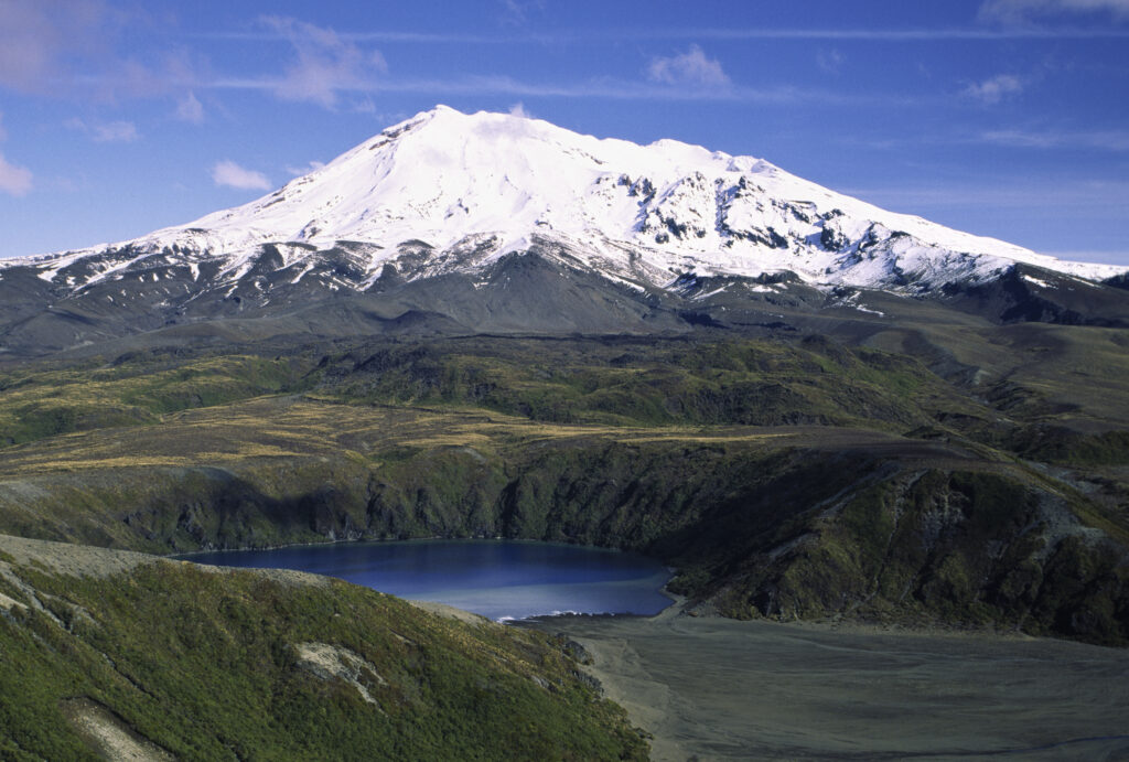 NEW ZEALAND, Central Plateau, Tongariro National Park. View looking towards lower Tama lake and the dormant volcanoe Mt Ruapehu