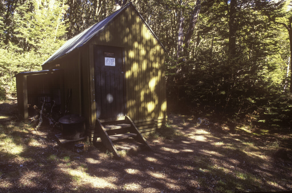 NEW ZEALAND, Canterbury, Craigieburn Forest Park. The cosy Cass Saddle hut on the Cass Lagoon Saddle Track