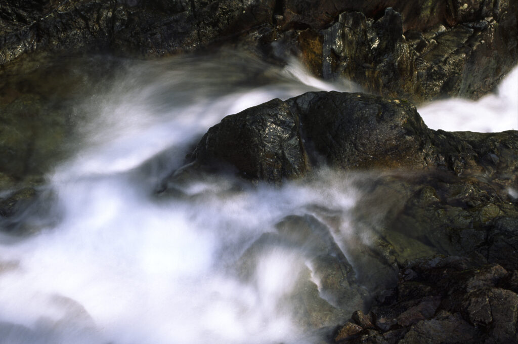 ENGLAND, Cumbria, Lake District National Park. The flowing waters of Dungeon Ghyl force in Langdale Fell
