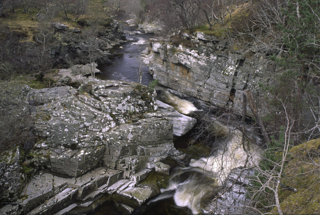 SCOTLAND, Scottish Highlands, Cairngorms National Park. The fast flowing River Truim runs through a gorge towards Lynchat.