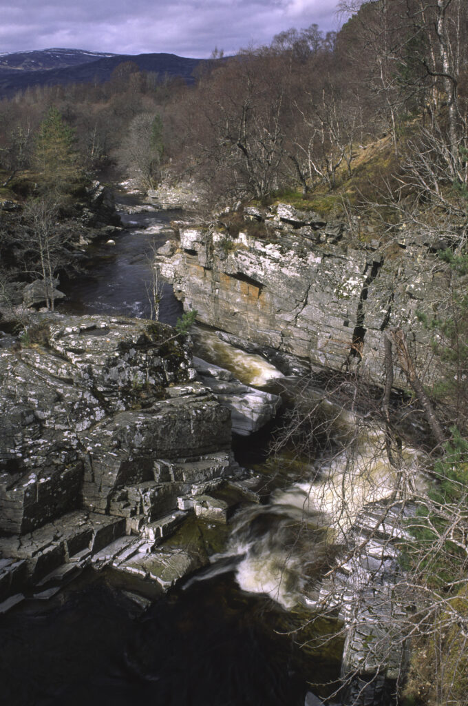 SCOTLAND, Scottish Highlands, Cairngorms National Park. The fast flowing River Truim runs through a gorge towards Lynchat.