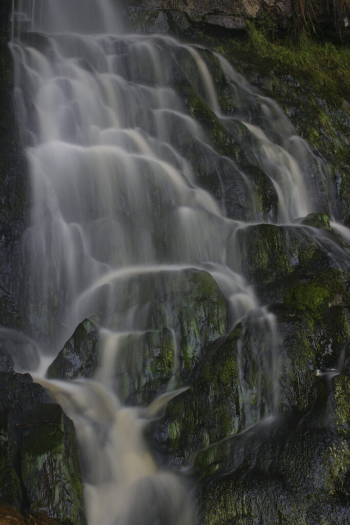 ENGLAND, Yorkshire, Yorkshire Dales National Park. The fast flowing waters of the Thornton Force waterfall, near Ingleton.