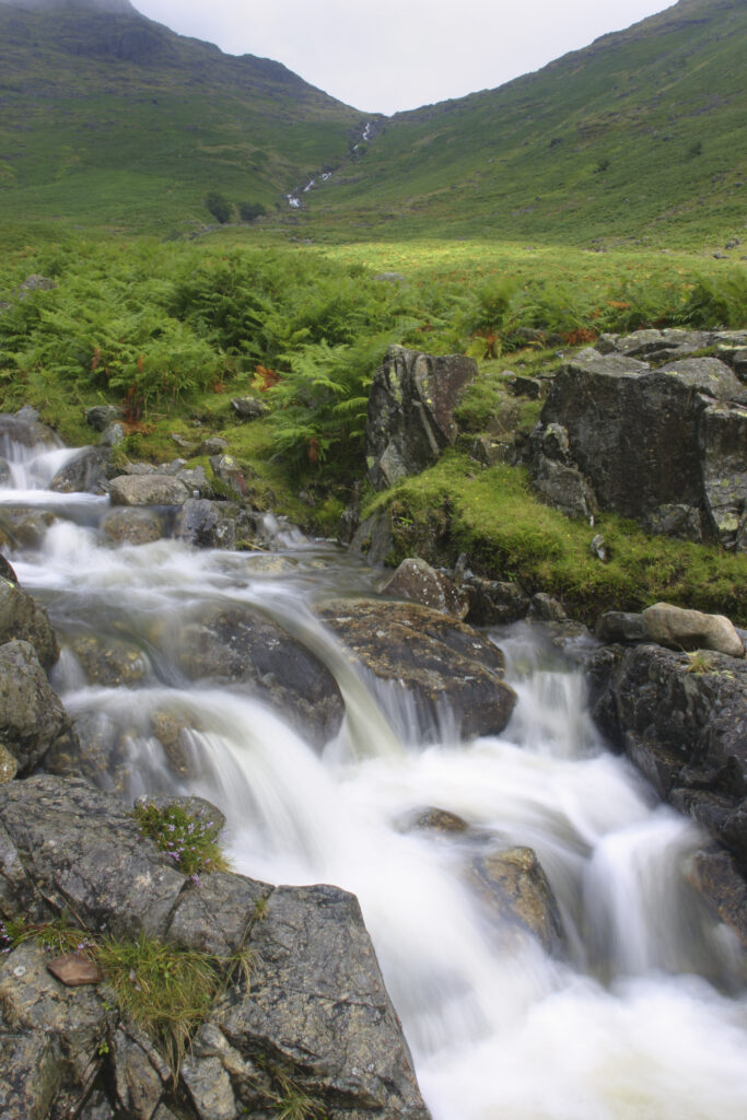 ENGLAND, Cumbria, Lake District National Park. The fast flowing waters of the Stake Gill flowing from Stake Pass near Langdale, on the Cumbria Way.