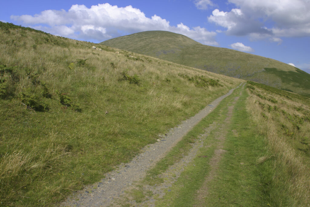 ENGLAND, Cumbria, Lake District National Park. The well formed path of the Cumbria Way running alongside lower Lonscale