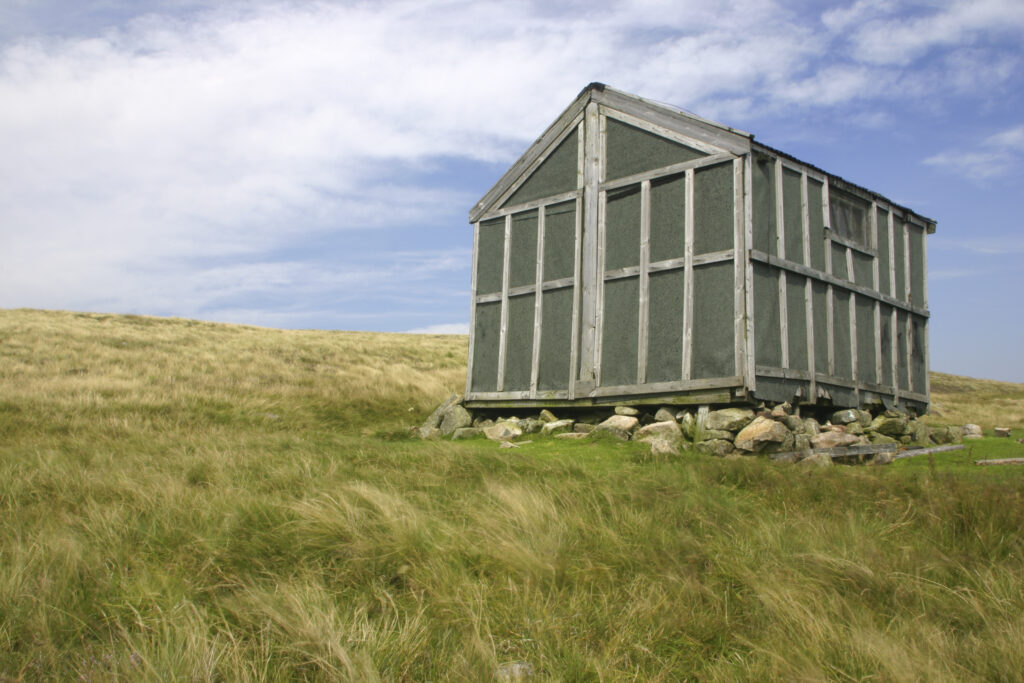 ENGLAND, Cumbria, Lake District National Park. Lingy Hut provides emergency shelter to hikers on Lingy Hill on the Cumbria Way