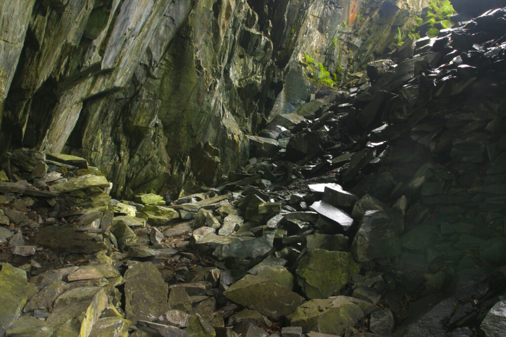 ENGLAND, Cumbria, Lake District National Park. A disused quary near to the Cumbria Way track and dalt wood close to Borrowdale