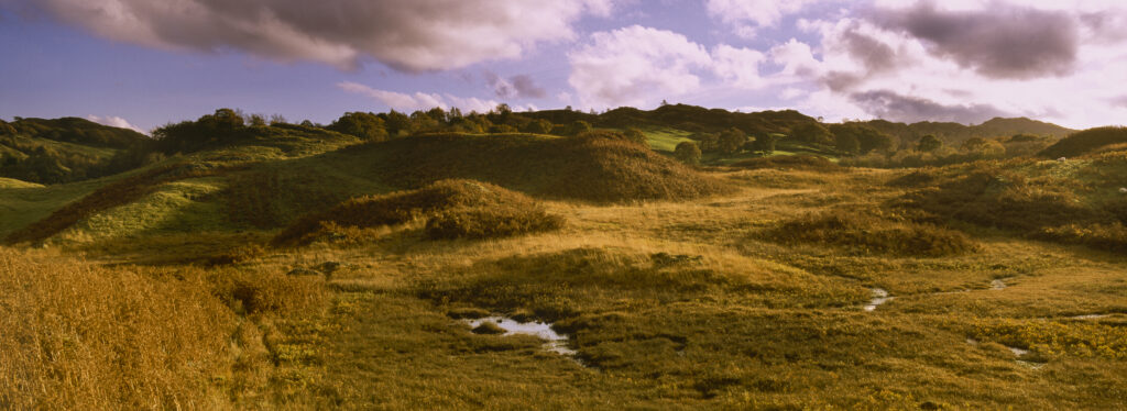 ENGLAND, Cumbria, Lake District National Park. View looking towards the autumn landscape of Great How and high Oxen fell, on the Cumbria Way.
