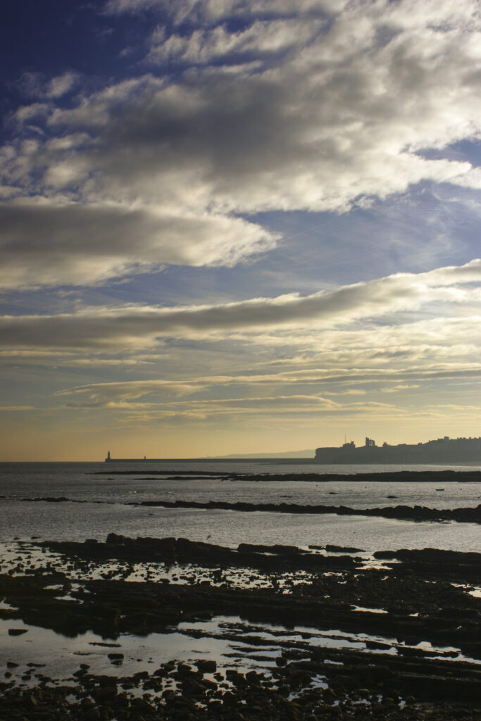 England, Tyne and Wear, Cullercoats. Looking towards the North tyne pier and Tynemouth on a mid winters day