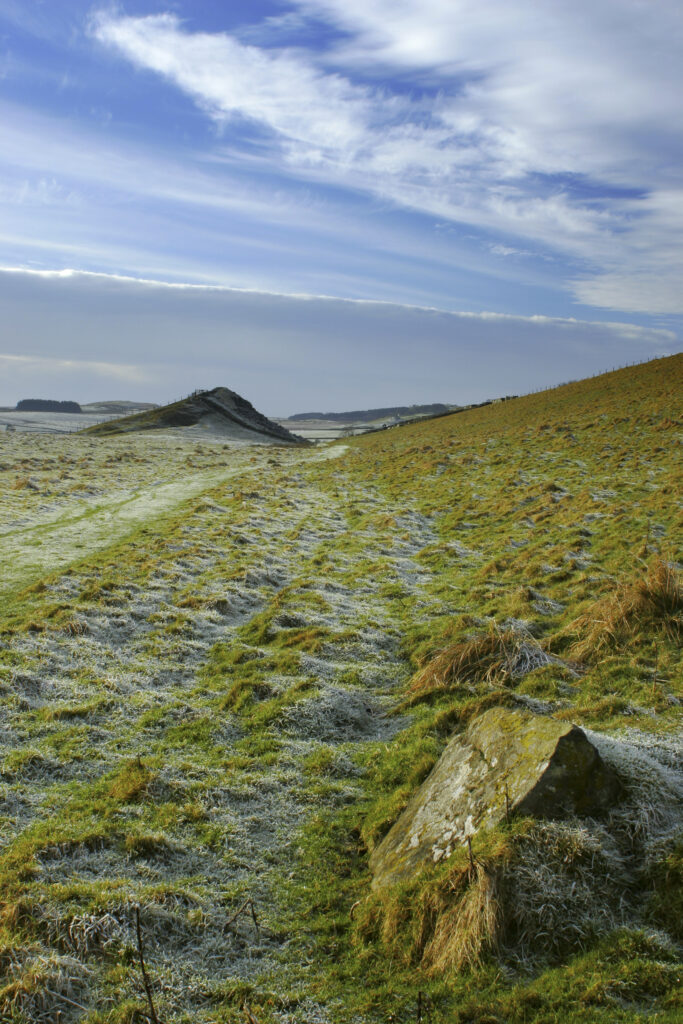 ENGLAND, Northumberland, Hadrians Wall. Looking towards Cawfields from a track below the Wall near the town of Haltwhistle