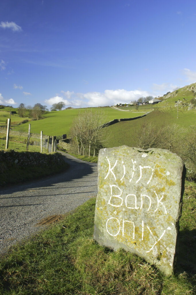 England, Cumbria, Lake District National Park. The Cumbria Way track follows the road from Kendall ground to Kiln Bank