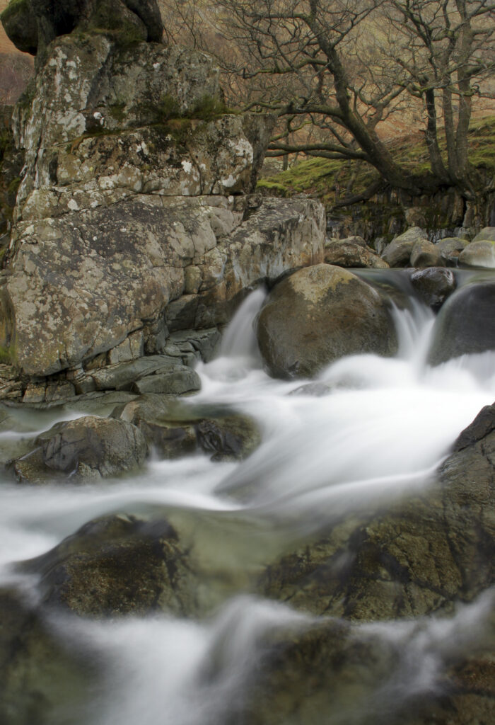 ENGLAND, Cumbria, Lake District National Park. The fast flowing waters of the Gallen Force near Stonethwaite.