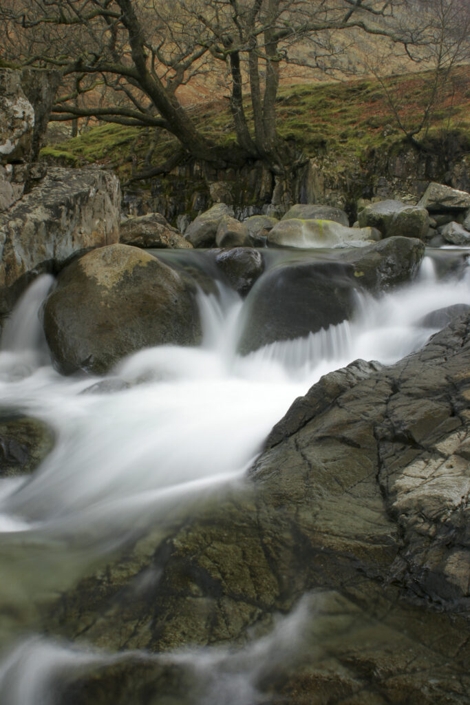 ENGLAND, Cumbria, Lake District National Park. The fast flowing waters of the Gallen Force near Stonethwaite.