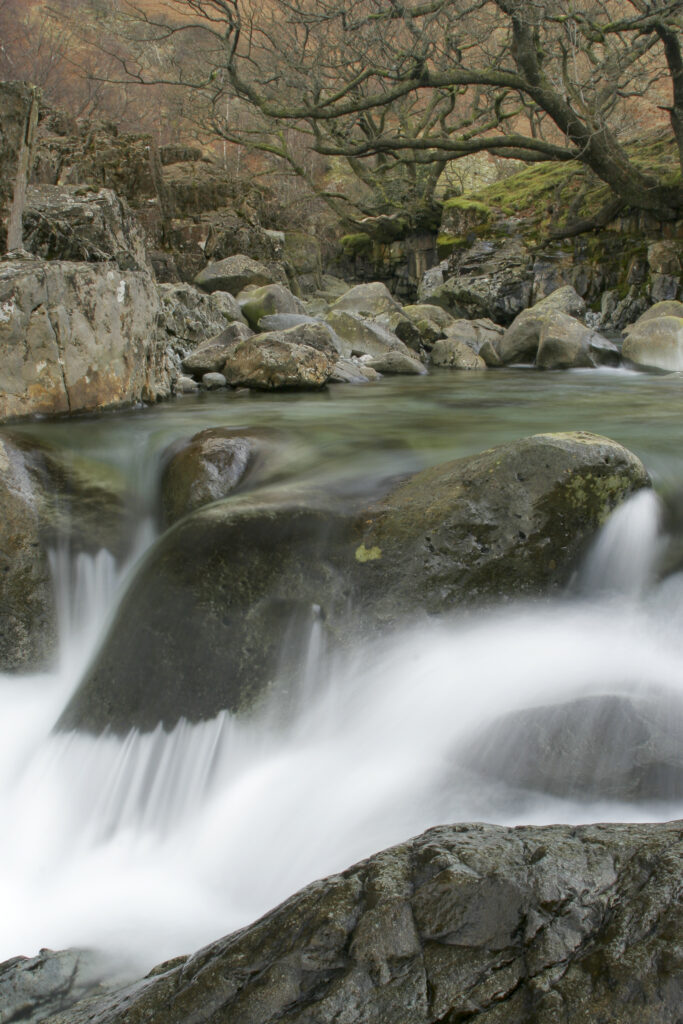 ENGLAND, Cumbria, Lake District National Park. The fast flowing waters of the Gallen Force near Stonethwaite.