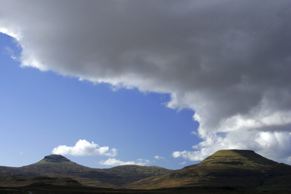 Scotland The Isle Of Skye Macleods Tables Cloud formations above Healabhal Mhòr and Healabhal Bheag near Dunvegan