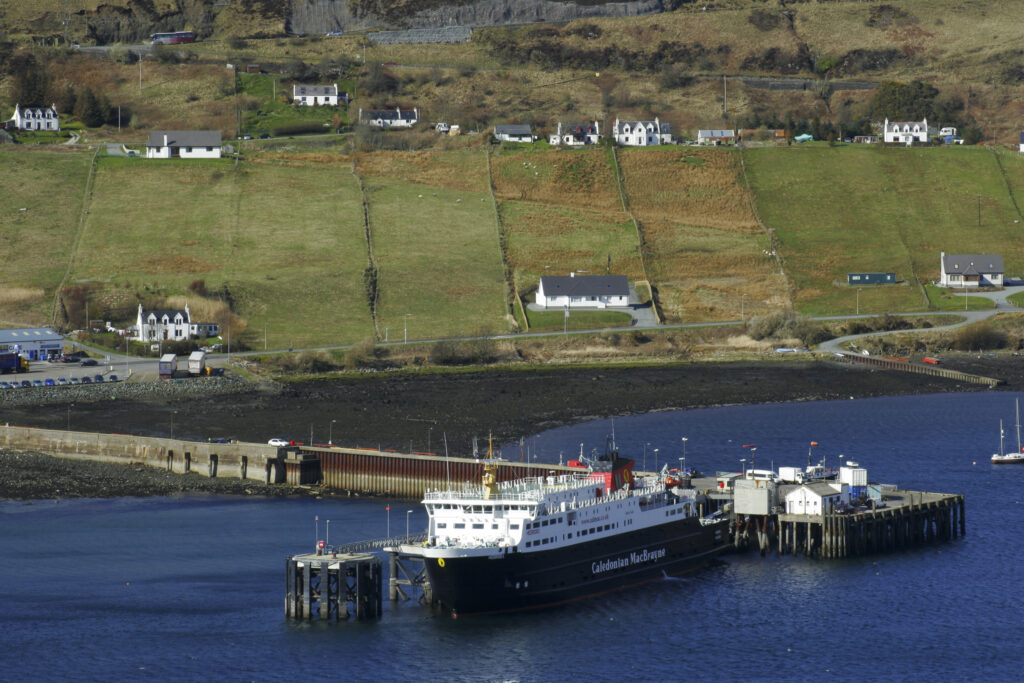 Scotland The Isle of Skye Uig View looking towards Uig Bay with the Caledonian MacBrayne Ferry and the port and town of Uig
