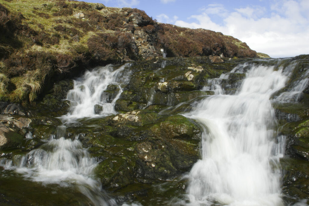Scotland Isle Of Skye Uig A small highland stream running through the hills near the Trotternish ridge