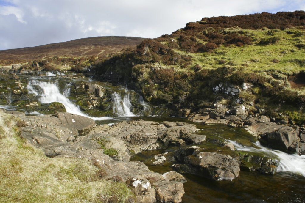 Scotland Isle Of Skye Uig A small highland stream running through the hills near the Trotternish ridge