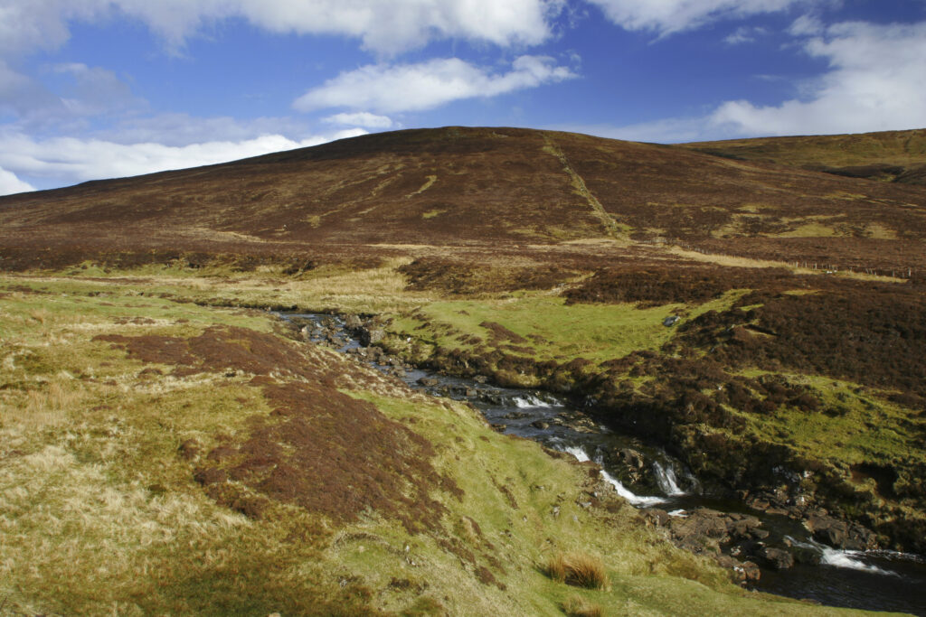Scotland Isle Of Skye Uig A small highland stream running through the hills near the Trotternish ridge