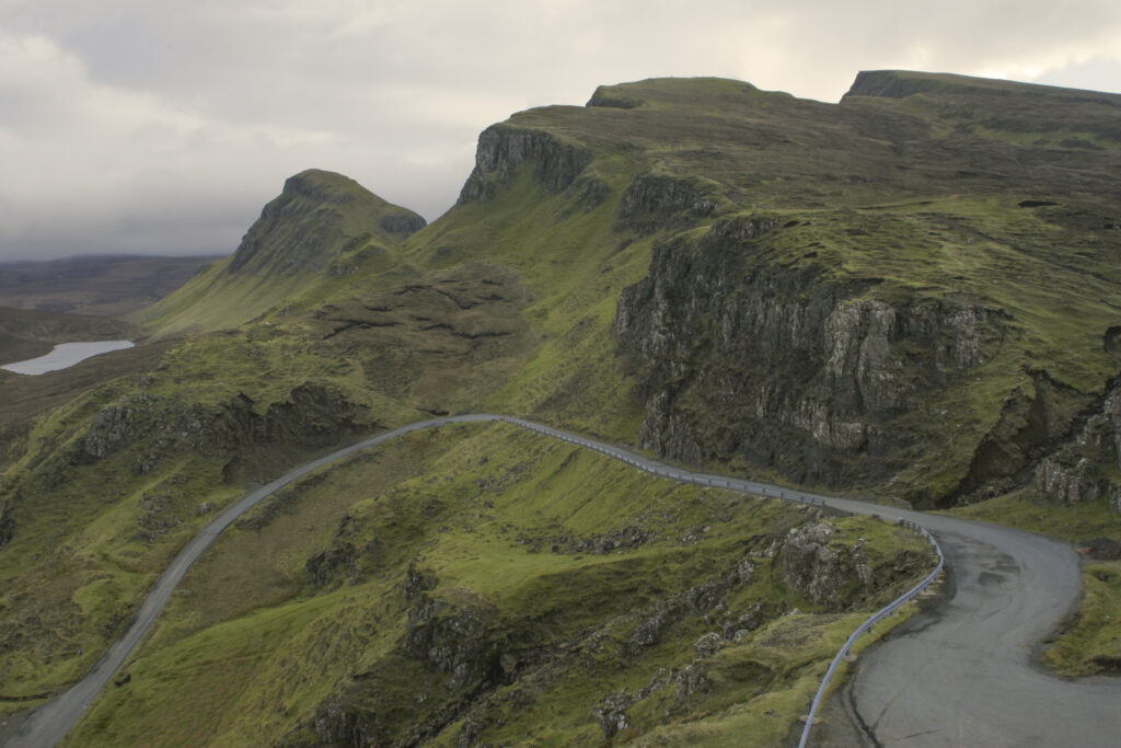Scotland Isle Of Skye Trotternish ridge Road running below the impressive features of the Quiraing and surrounding features