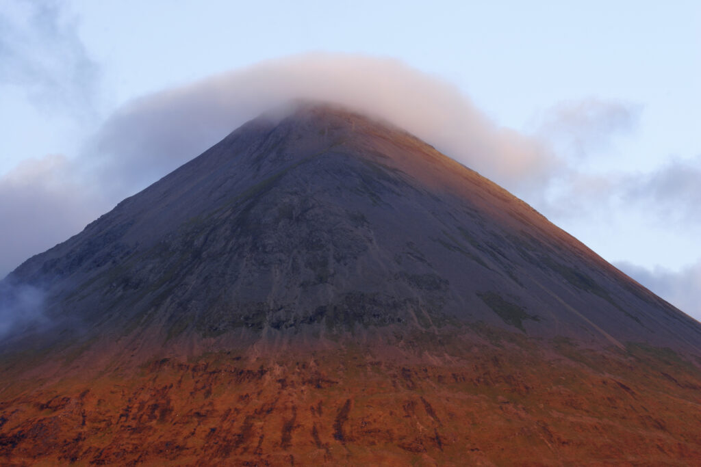 Scotland Isle of Skye Glen Sligachan Evening light iluminates the red hues of the wild mountain landscape of Glen Sligachan