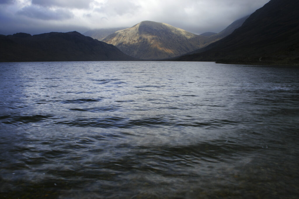 Scotland Isle of Skye Glen Strath na Creitheach Stormy skies above the Loch an Athain in the Strach na Creitheach