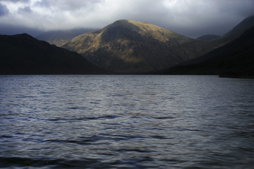 Scotland Isle of Skye Glen Strath na Creitheach Stormy skies above the Loch an Athain in the Strach na Creitheach