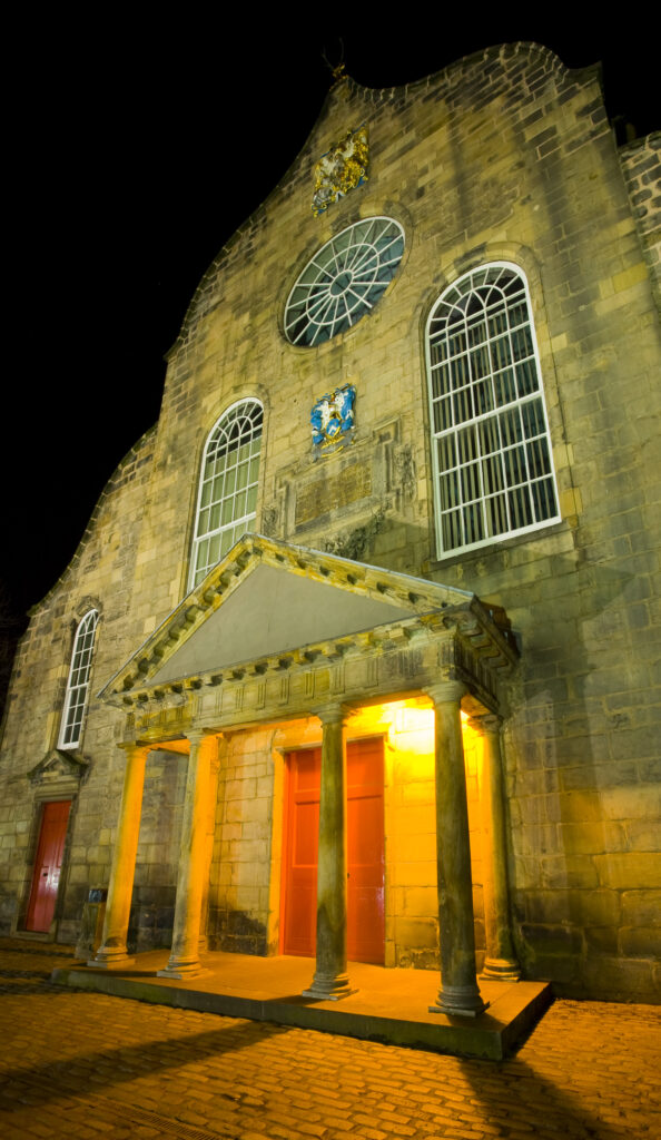 Scotland, Edinburgh, The Royal Mile. Canongate Kirk, located in Canongate a former separate burgh before becoming part of Edinburgh in 1856, was built in 1691 by Scottish architect James Smith.