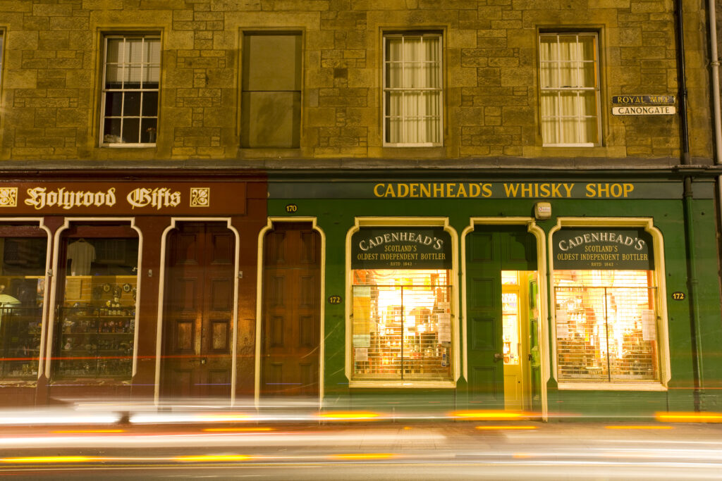 Scotland, Edinburgh, The Royal Mile. Whisky shop on Canongate, part of the Royal Mile.