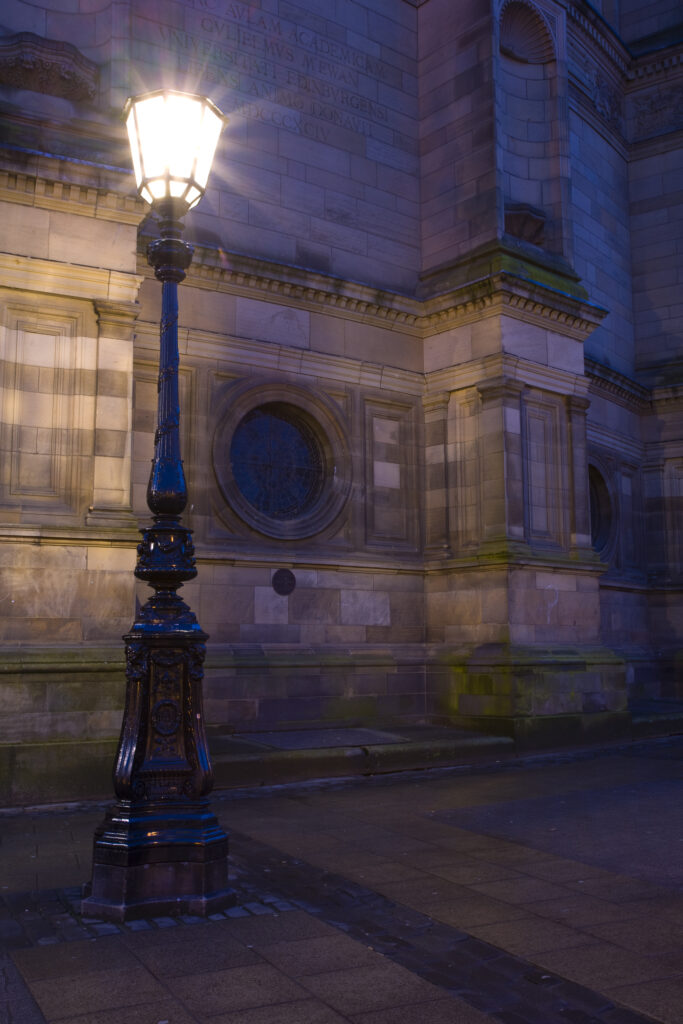 Scotland, Edinburgh, Edinburgh City. Ornate lamp alongside the McEwan Hall, part of the University of Edinburgh complex.